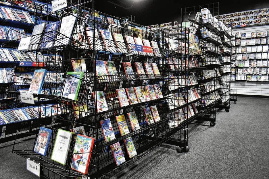 Nintendo Switch games on a wire display at Game World’s South Indianapolis location